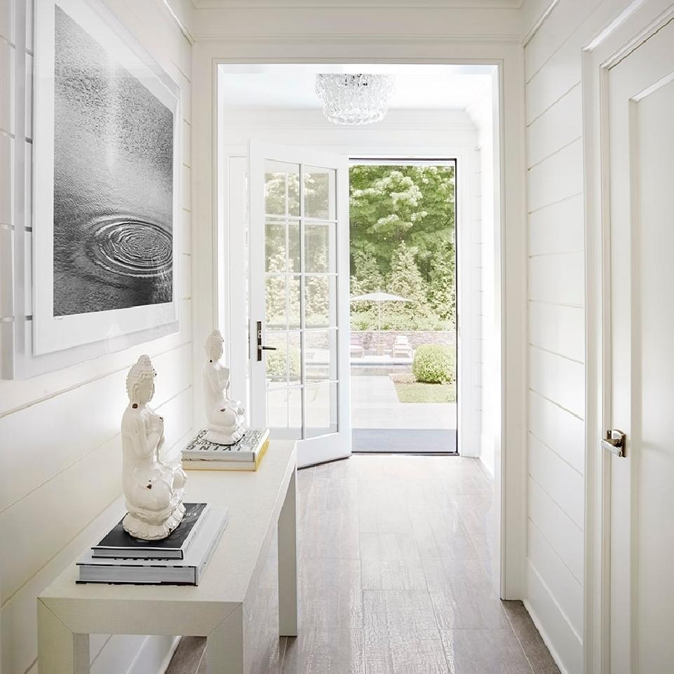 Hallway with Buddha and French Doors